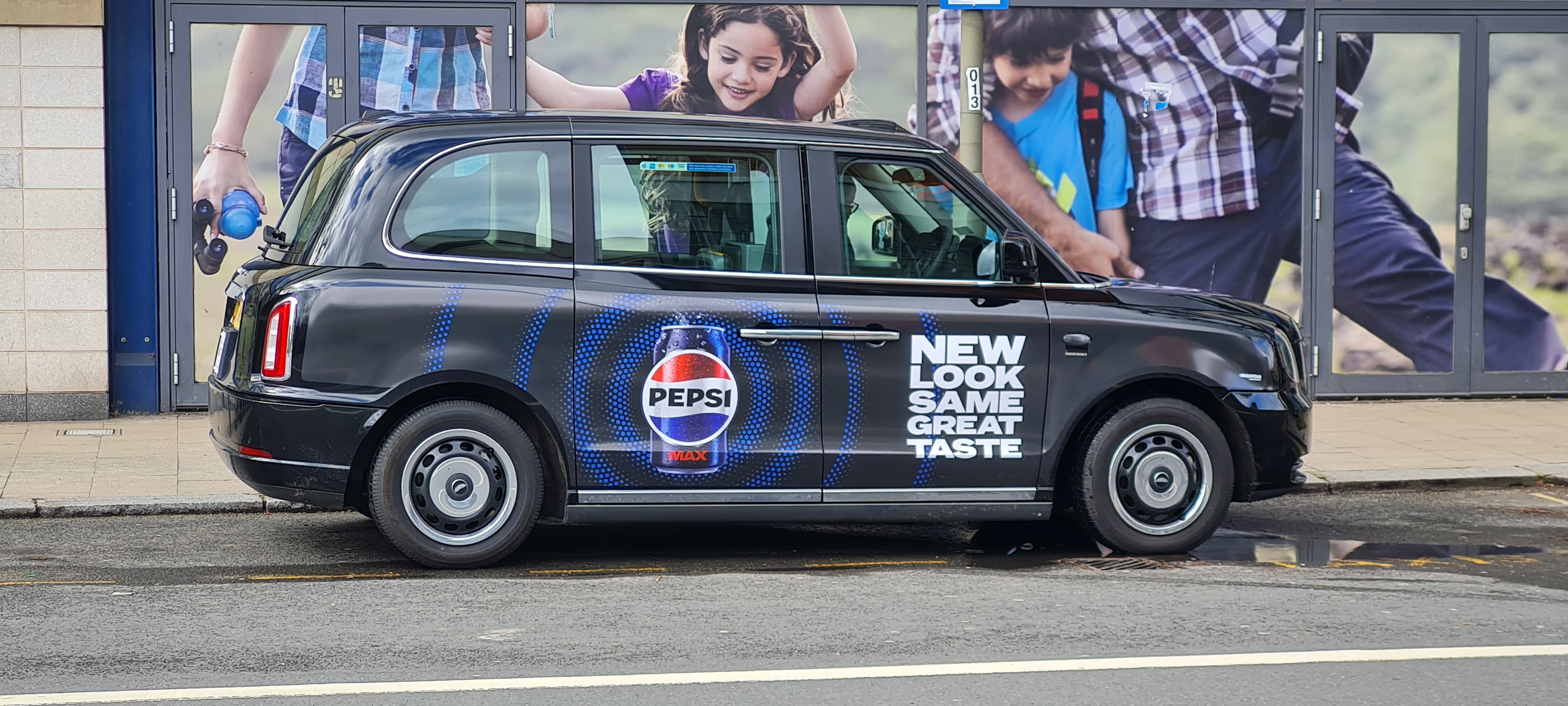 Black cab promoting Pepsi