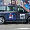 Black cab promoting Pepsi
