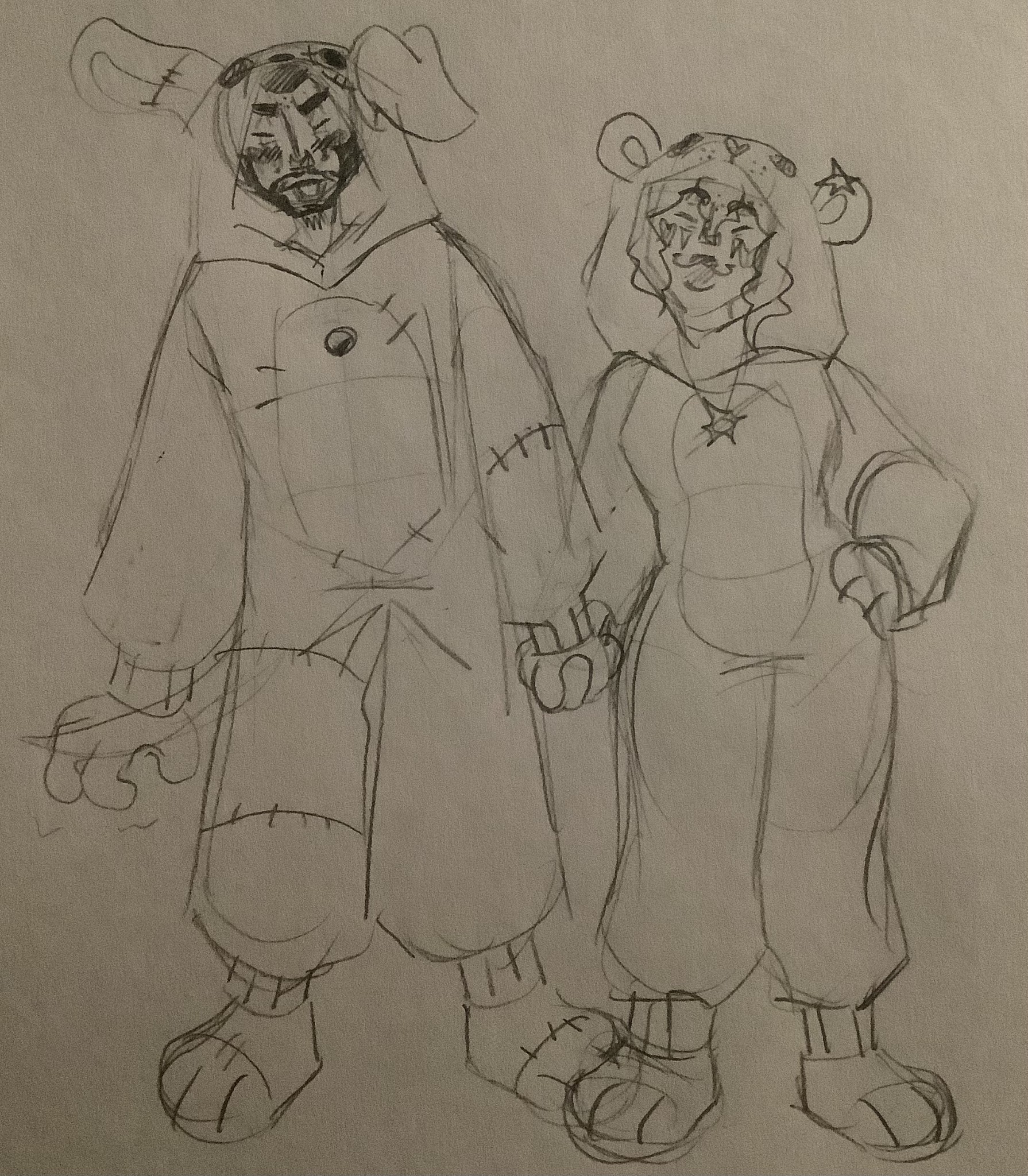 Martin GreyWhinder and Mari Faucher pose in their onesies (Harmony and Horror)