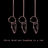 three dead men hanging in a row