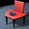 A Red Chair and a Funky Bowl of Water